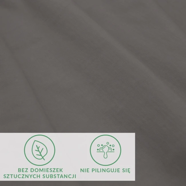 Prześcieradło jersey z elastanem w kolorze antracytowym, w rozmiarze 90x200, leżące na płasko. Wysoka jakość materiału, gładka faktura. Widoczna informacja o braku sztucznych substancji oraz odporności na piling. Tło proste, szare.