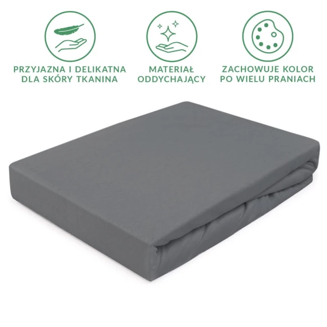 Prześcieradło jersey z gumką w kolorze szarym, rozmiar 120x200 cm, leżące na białym tle. Materiał stworzony z myślą o komforcie, elastyczny i oddychający, z widoczną gumką na brzegach. Idealne do łóżka, zapewnia estetyczny wygląd oraz trwałość.