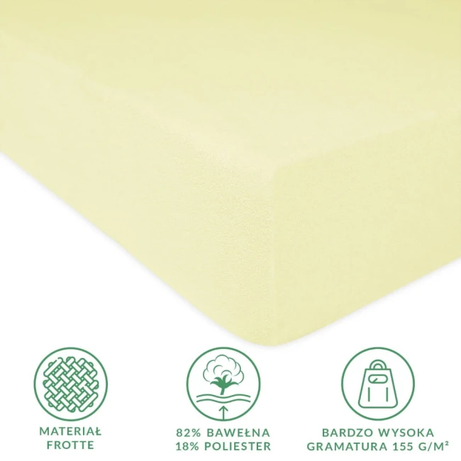 Prześcieradło frotte z gumką 120x200 w kolorze kremowym, leżące na płaskiej powierzchni. Widoczna faktura materiału, z informacjami o składzie (82% bawełna, 18% poliester) oraz wysokiej gramaturze 155 g/m². Proste tło.