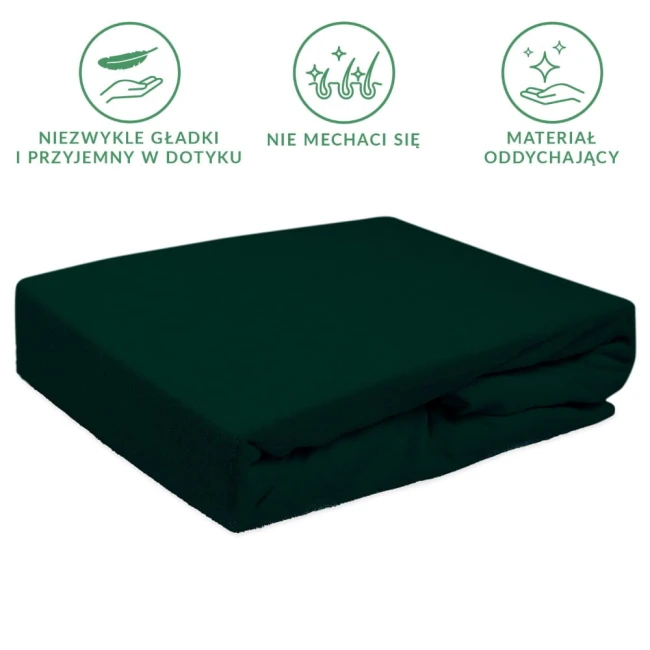 Prześcieradło frotte z gumką w kolorze zieleni butelkowej o wymiarach 140x200, ułożone w poziomie. Wykonane z miękkiego materiału, o gładkiej fakturze. Widoczna gumka zapewniająca dopasowanie. Tło jasne, neutralne, co podkreśla intensywność koloru.