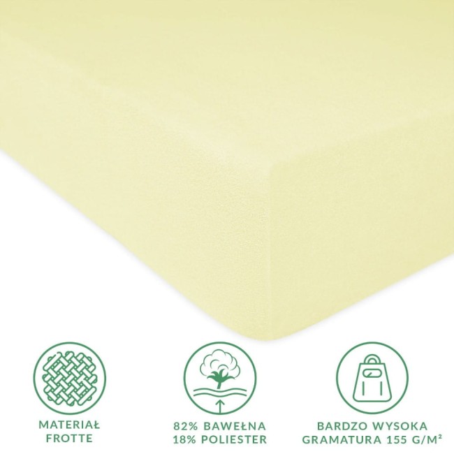 Prześcieradło frotte z gumką 180x200 w kolorze kremowym, o fakturze miękkiej w dotyku. Widoczny detal dotyczy materiału: 82% bawełny, 18% poliestru. Produkt leży na płasko, z widoczną gumką zabezpieczającą. Tło jest proste, jednolite.