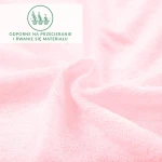 Prześcieradło frotte z gumką 180x200 w kolorze różu kwarcowego, z miękką, teksturowaną powierzchnią, leżące na gładkiej powierzchni. Widoczne oznaczenie dotyczące odporności na przecieranie i rwanie materiału.