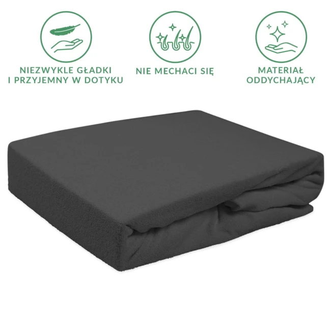 Prześcieradło frotte z gumką o wymiarach 200x220 w kolorze antracytowym, leżące na płaskiej powierzchni, z widoczną fakturą materiału. Złożone i wygładzone, brak dekoracji oraz widocznych napisów. Tło proste, jednolite.