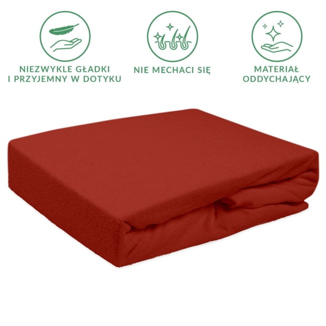 Prześcieradło frotte z gumką w kolorze bordowym, rozmiar 200x220 cm, leżące na białym tle. Wykonane z oddychającego materiału, prezentuje się jako gładkie, nie mechacące się, z widoczną gumką na brzegach.