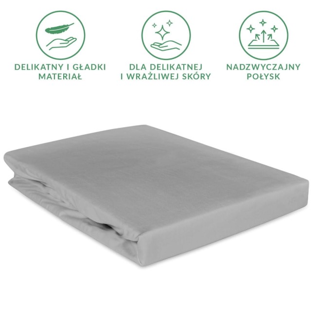Prześcieradło satynowe z gumką 160x200 w kolorze popielatym, leżące na równym tle. Wykonane z gładkiego materiału, z delikatnym połyskiem. Zastosowana gumka zapewnia idealne dopasowanie. Idealne do sypialni dla osób ceniących komfort.