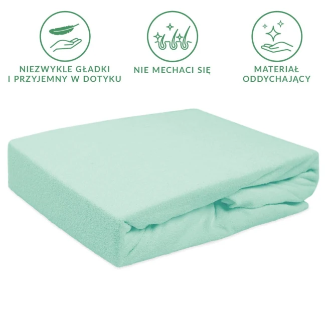 Prześcieradło frotte z gumką 40x90 w kolorze morskim, leżące na białym tle. Materiał gładki, przyjemny w dotyku, idealnie dopasowuje się do materaca. Produkt jest złożony, ukazując jego delikatną teksturę oraz estetyczny wygląd.