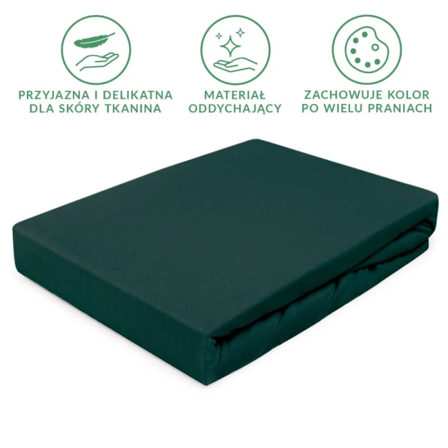 Prześcieradło jersey z gumką 90x200 w kolorze zieleni butelkowej, leżące na białym tle. Materiał oddychający, przyjazny dla skóry, zachowujący kolor po praniach. Widoczna guma na brzegach, zapewniająca idealne dopasowanie.