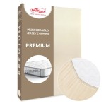 Prześcieradło jersey z gumką 90x200 w jasnym beżu, prezentowane w opakowaniu. W dolnym rogu widoczny detal gumki i faktura materiału. Na opakowaniu widnieje napis Premium oraz informacja o dopasowaniu do materacy wysokości do 25 cm. Tło jednorodne.