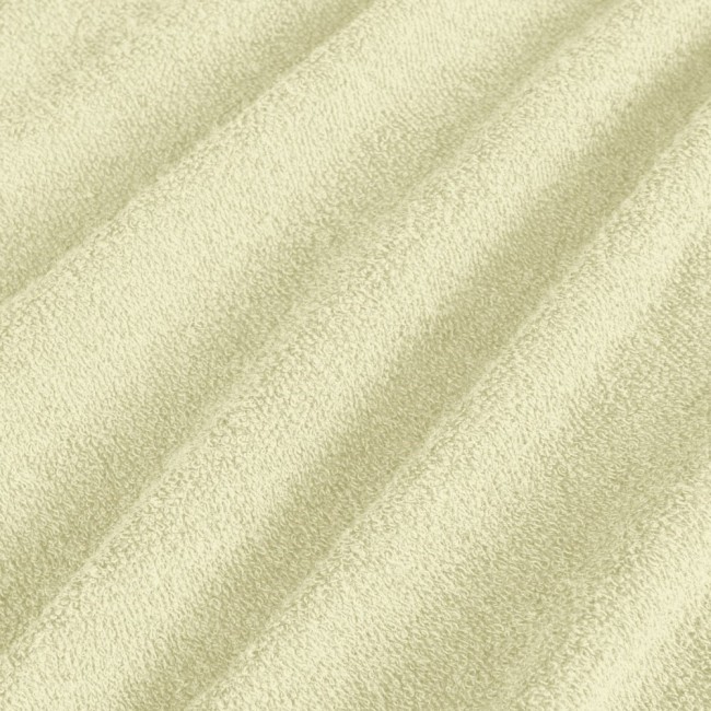 Pościel frotte 155x220 w kolorze kremowym, wykonana z miękkiego materiału o teksturowanej powierzchni. Widoczne są delikatne, faliste zagięcia, podkreślające strukturę tkaniny. Idealna do zapewnienia komfortu podczas snu.
